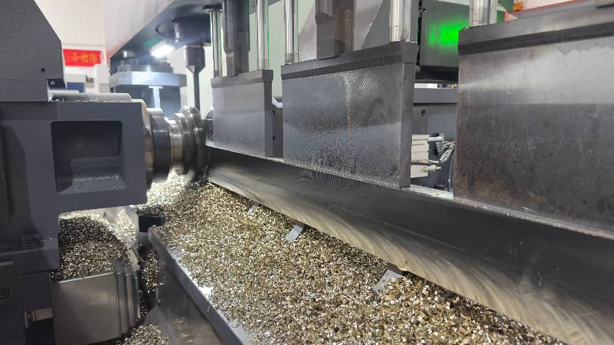 CNC duplex milling machine machining a mold steel block surface