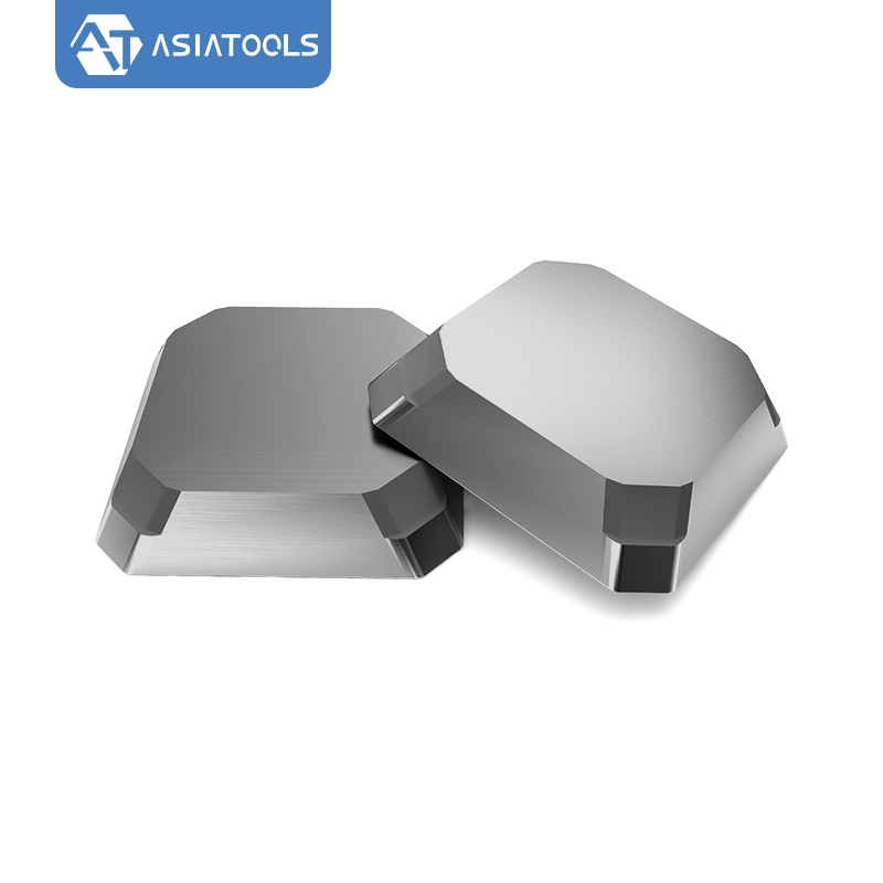 Face mill inserts showing cutting edges and wear surfaces