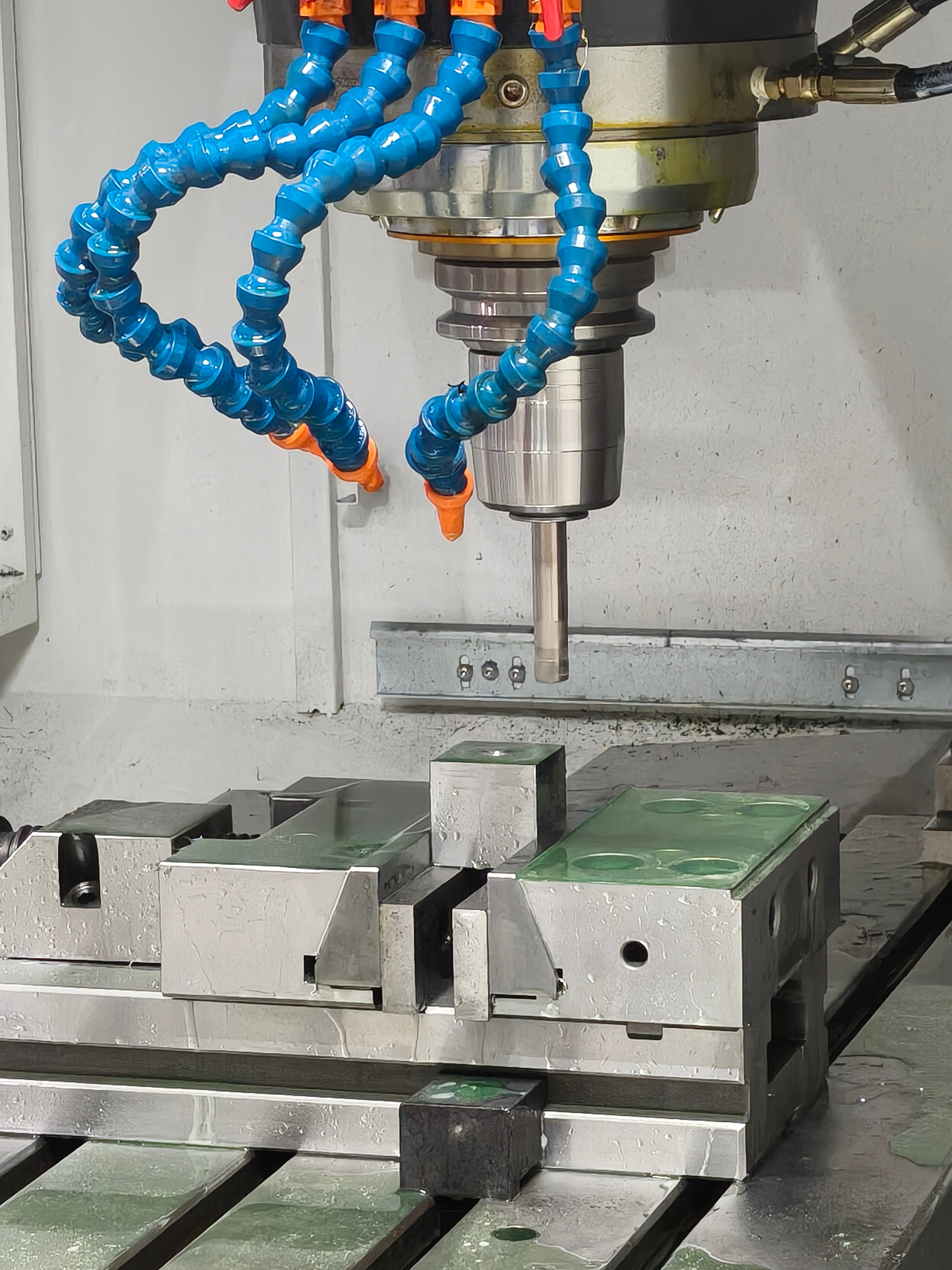 Ball nose end mill and coolant setup for precision mold finishing