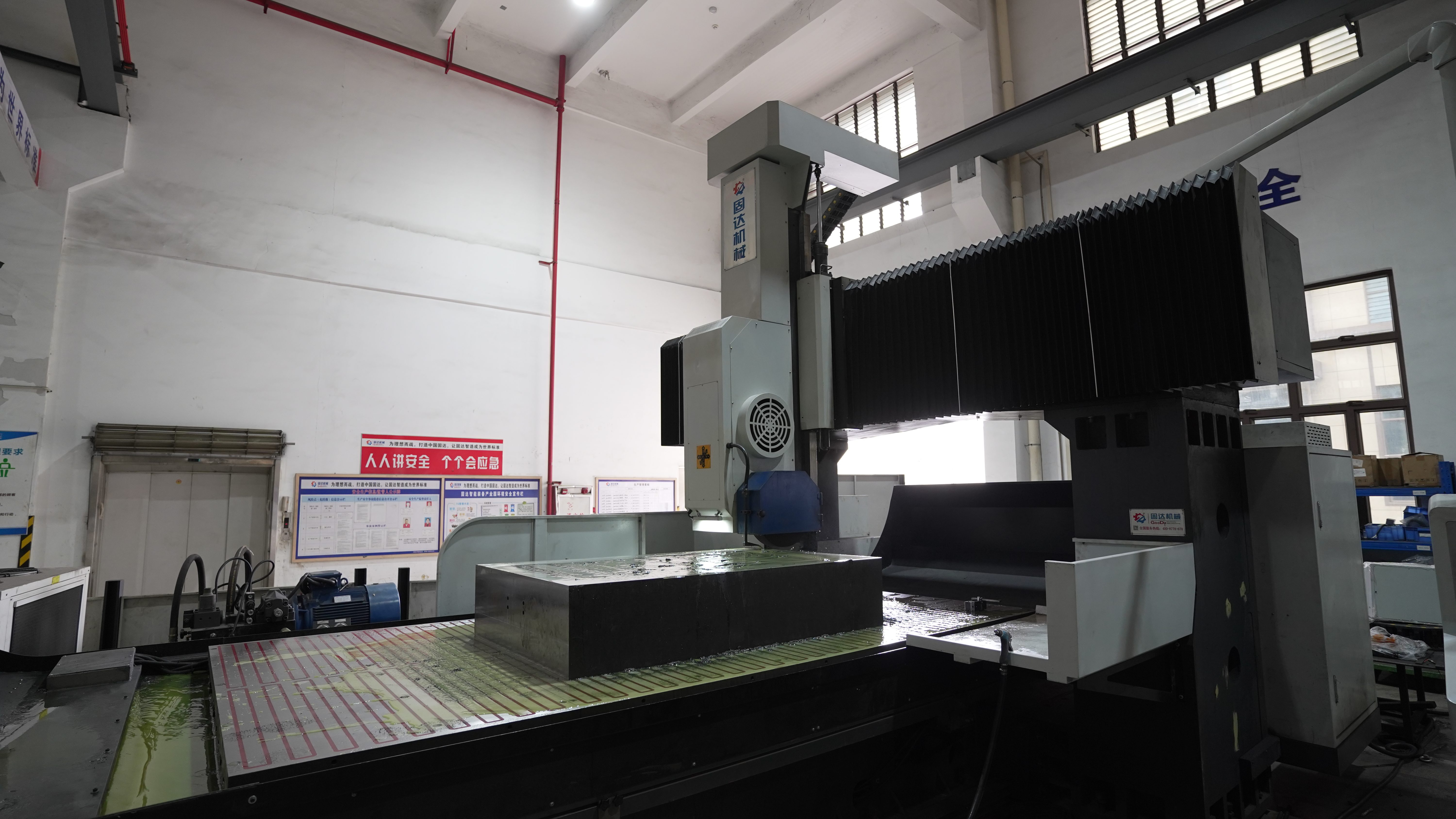 Large CNC surface grinding machine with a mold plate on the worktable