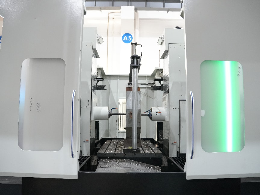 Large gantry style machine tool showing the machine structure and work area