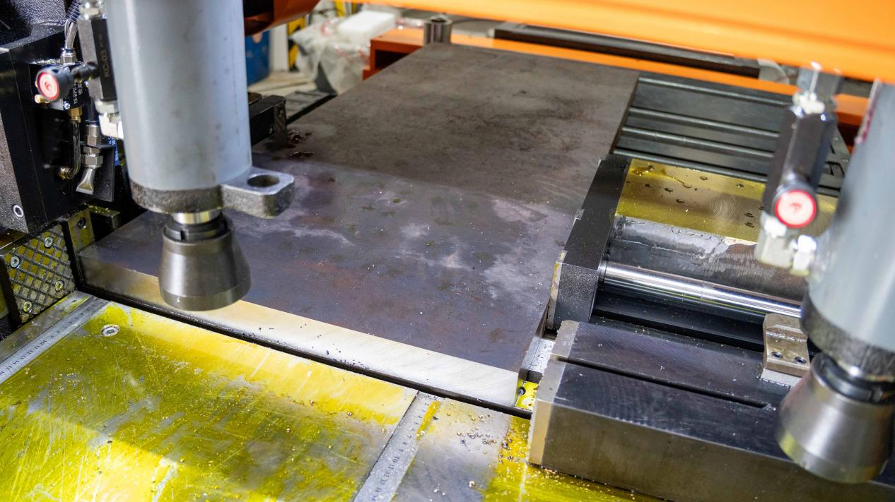 CNC machine setup processing a large metal workpiece