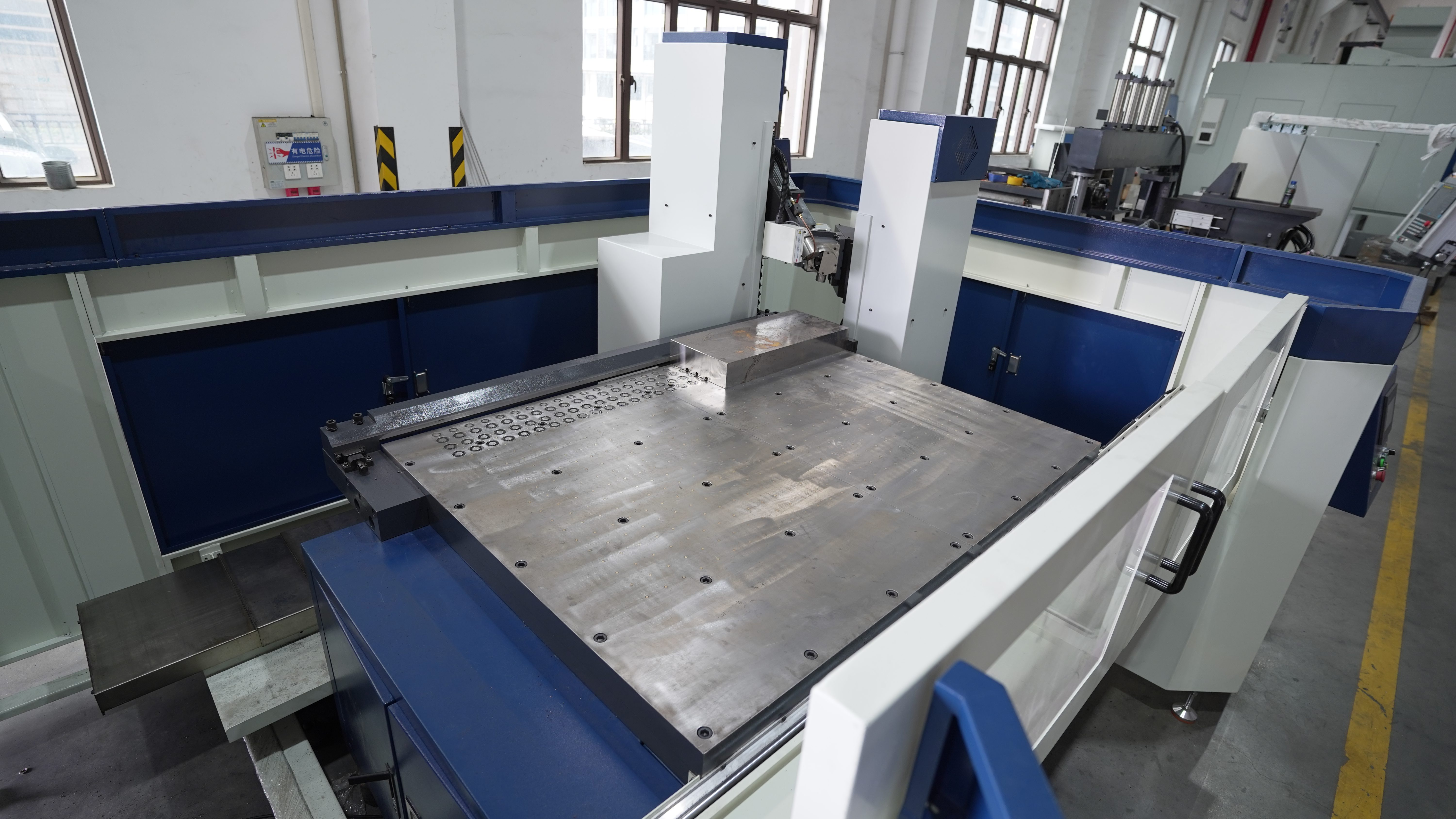 CNC chamfering machine worktable and mold steel machining area