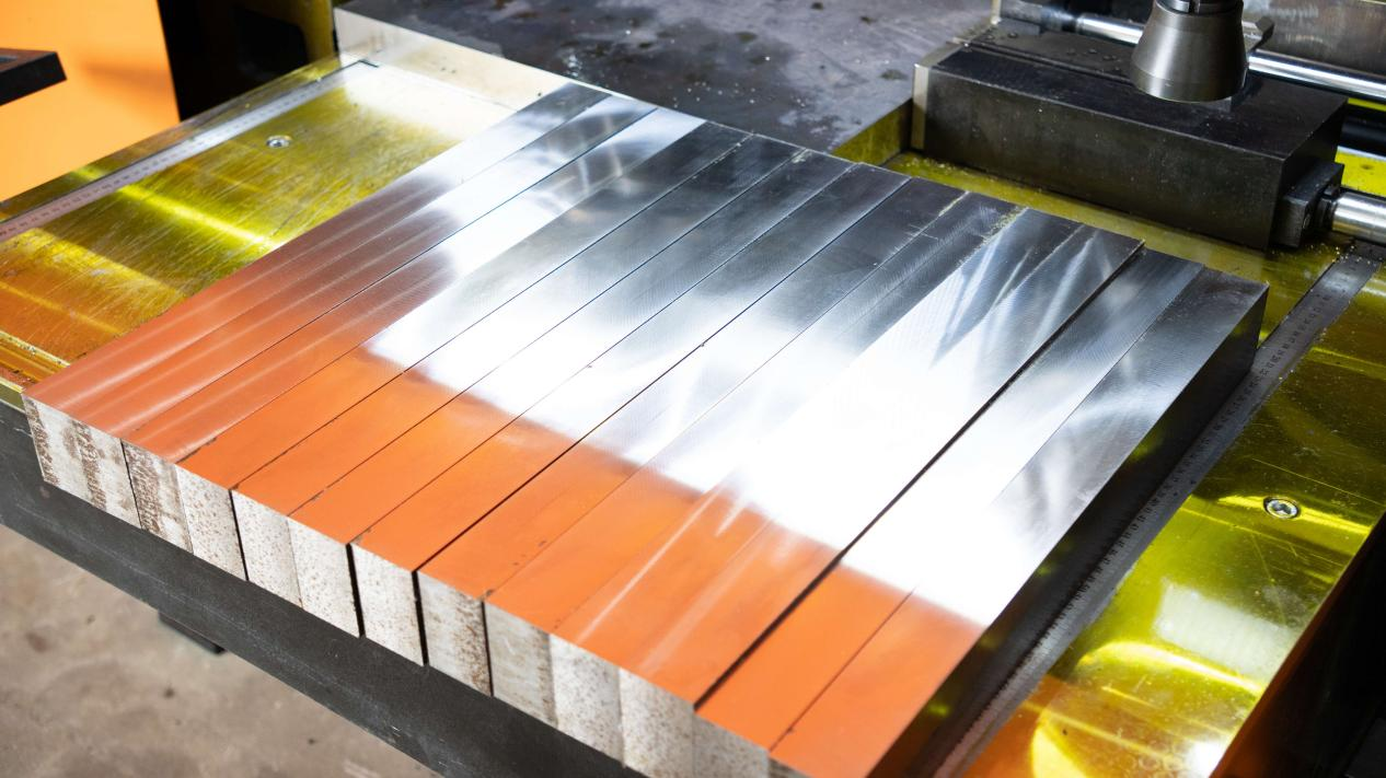 Machined metal blocks arranged after CNC processing