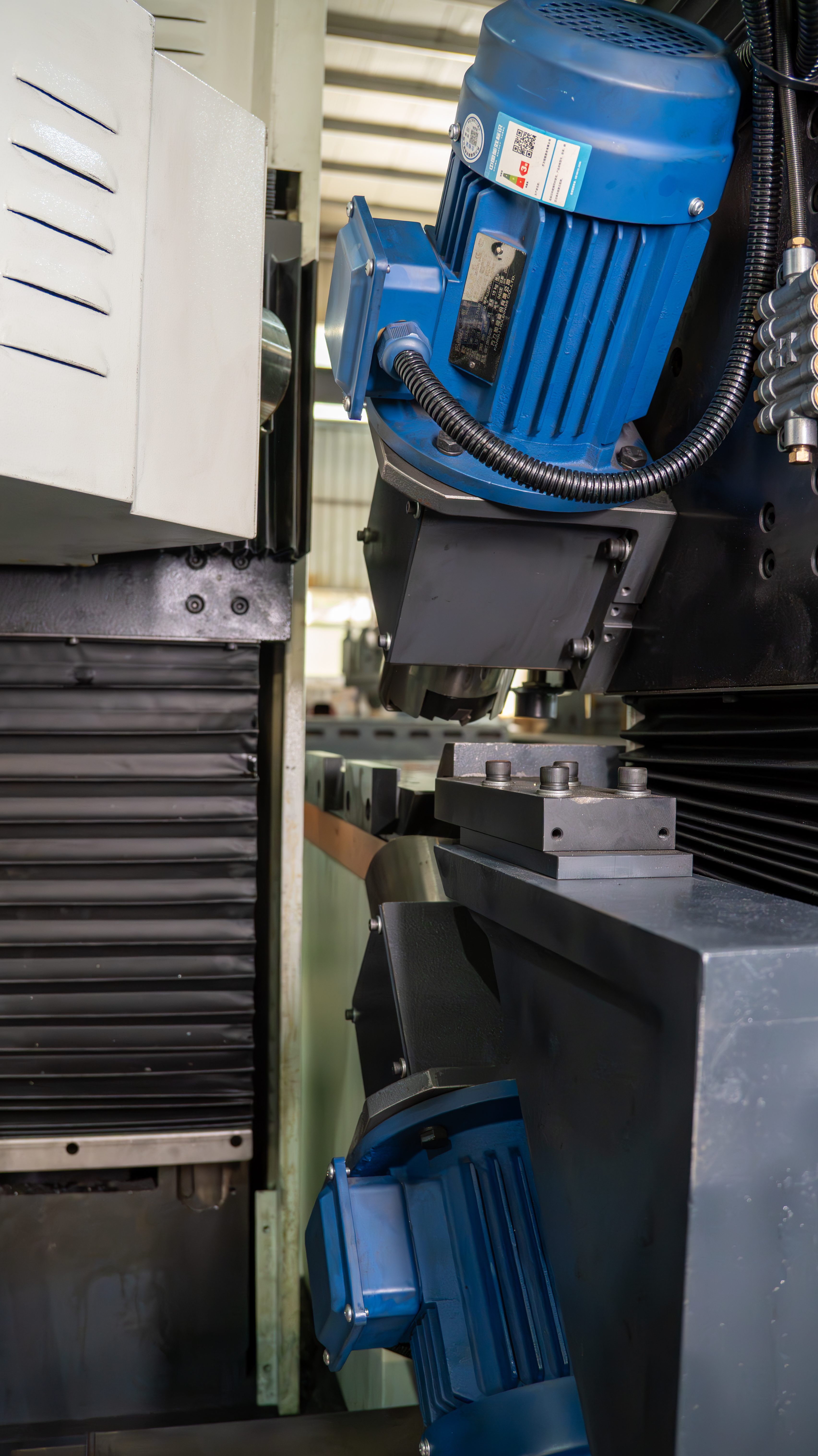 Close-up of chamfering machine measurement head and tooling